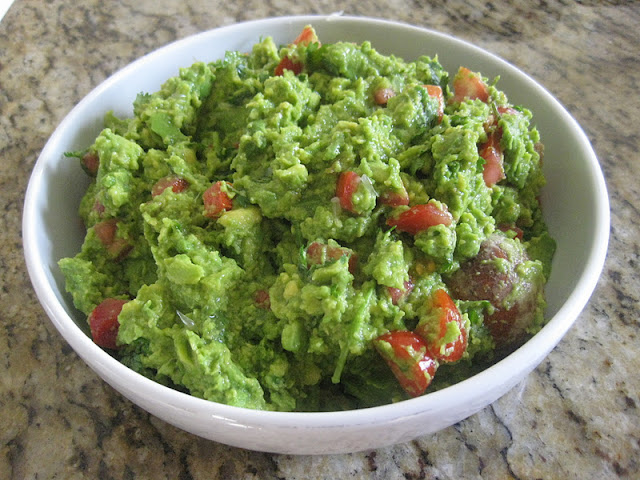 bowl of guacamole and tomato