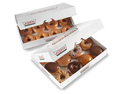 A dozen Krispy Kreme Original Glazed Donuts alongside an assorted dozen donuts.