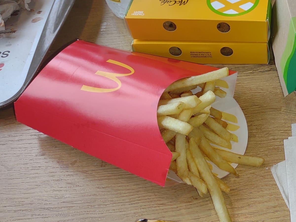 McDonalds Large Fries sitting on table