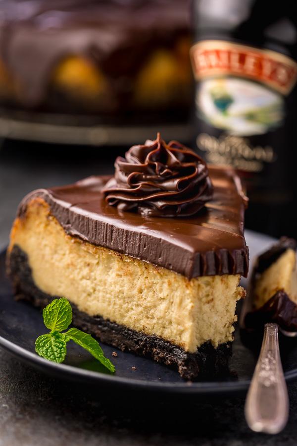 Love Baileys Irish Cream Liqueur? Crazy for cheesecake? Well then you have to try this Baileys Irish Cream Cheesecake! Featuring a chocolate cookie crust, creamy Baileys Irish Cream Cheesecake filling, and a thick layer of chocolate ganache. It's out of this world flavorful! And it's the perfect St. Patrick's Day dessert!