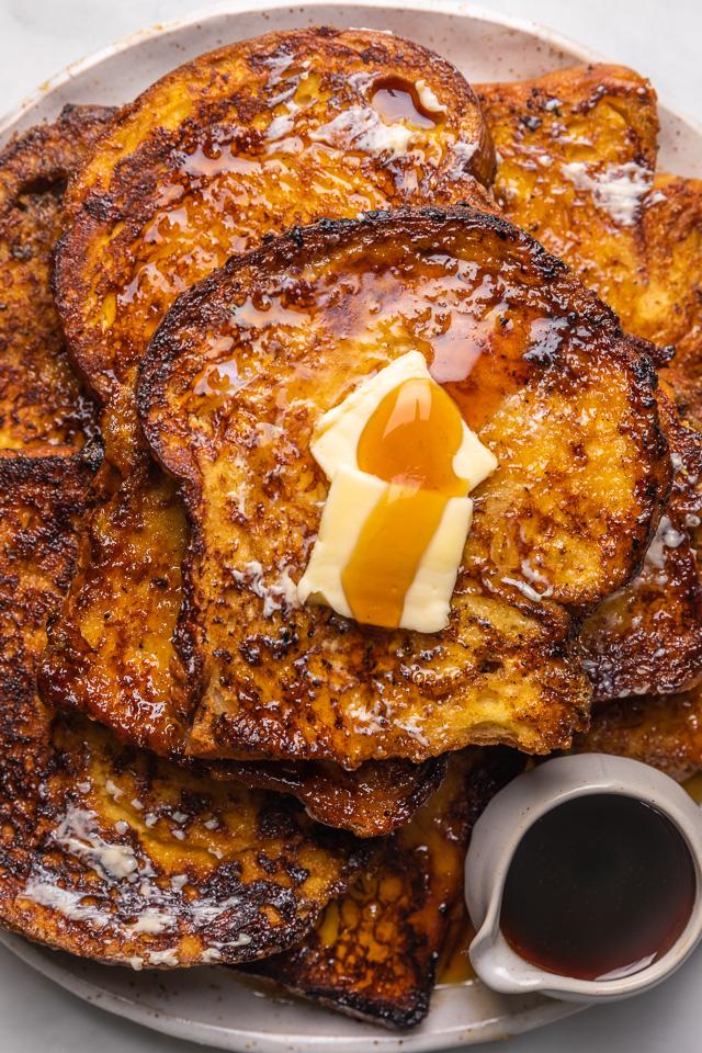 Today I'm teaching you how to make the BEST Easy French Toast! And you won't believe how quick and easy it is! Topped with maple syrup, this French toast recipe is sure to become one of your favorite breakfasts!