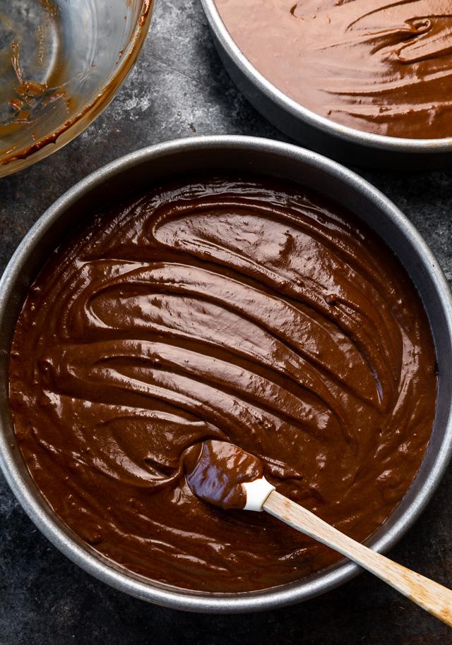 Batter for devil's food cake in cake pans.