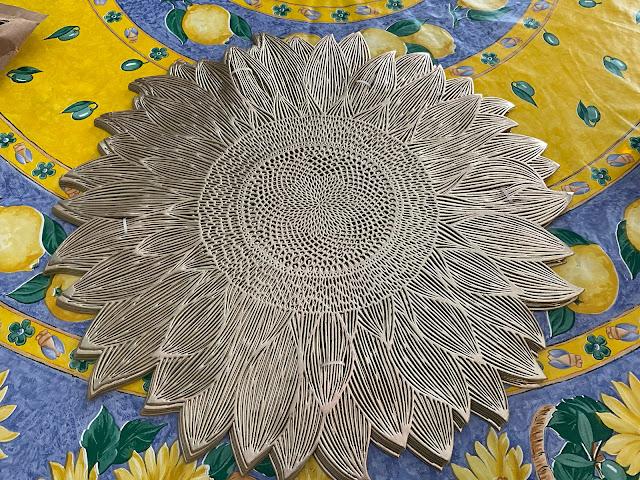 gold colored placemats looks like the sun shape