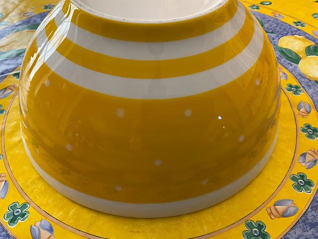 Yellow striped mixing bowl upside down