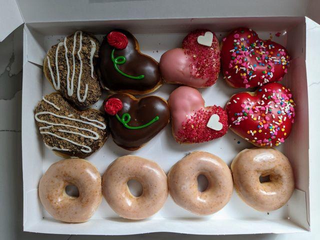 Krispy Kreme's Valentine's Day Donuts in an open box.