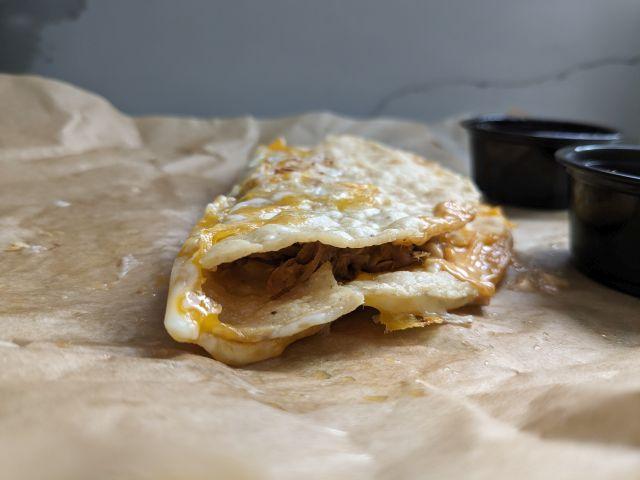 Taco Bell Grilled Cheese Dipping Taco cross-section.