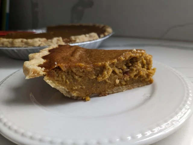 A slice of Village PieMaker Pumpkin Pie.