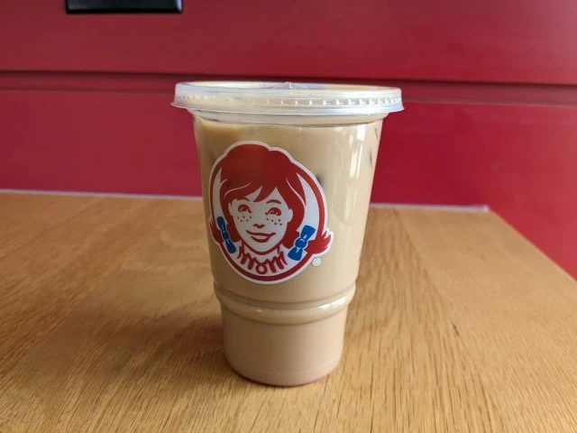 Side view of Wendy's Peppermint Frosty Cream Cold Brew.