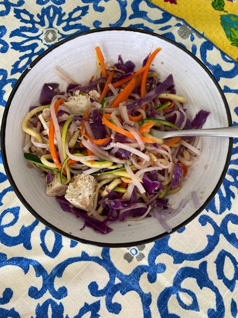 stir fry vegetables and tofu in a bowl