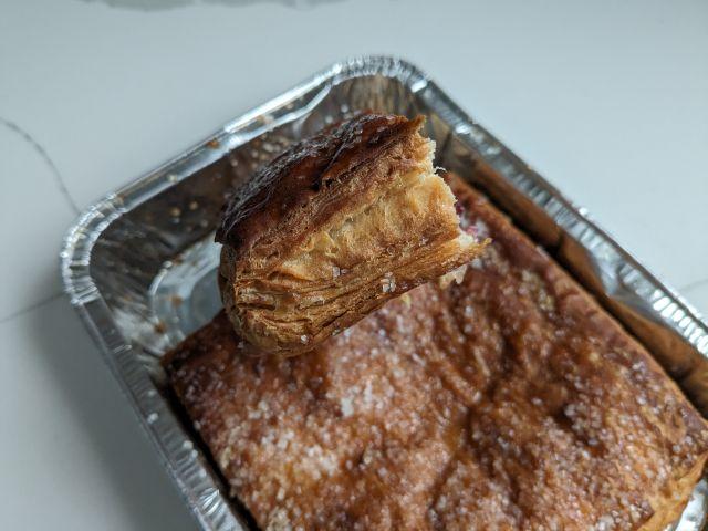 Close-up of the crust of Trader Joe's Raspberry Croissant Carré.