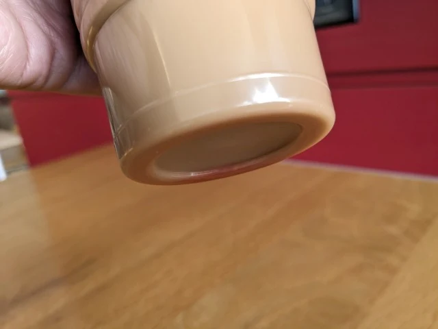 Bottom of a cup of Wendy's Peppermint Frosty Cream Cold Brew.