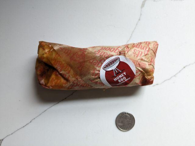 A Honey BBQ KFC Wrap in its wrapper.