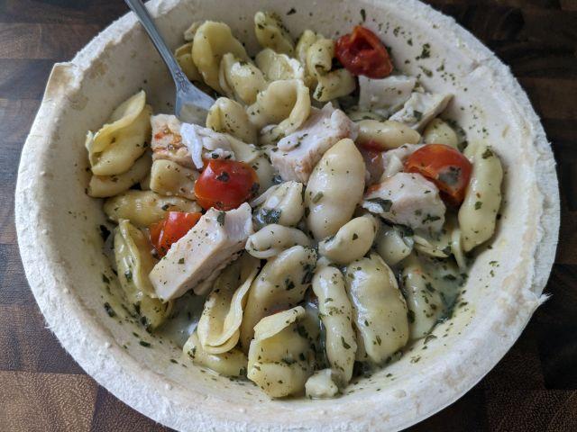 Marie Callender's Grilled Chicken Pesto Pasta Bowl close-up of bowl.