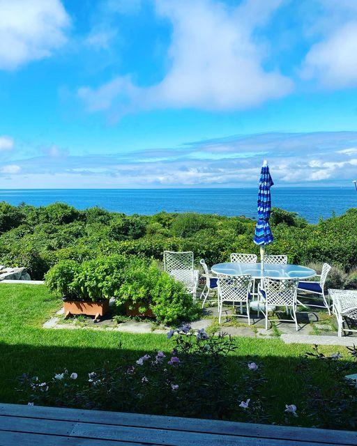 beach view, backyard with table and umbrella