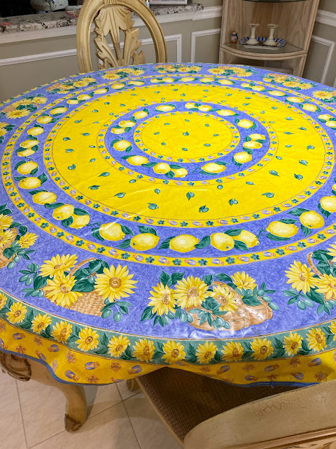 yellow and blue tablecloth on a table