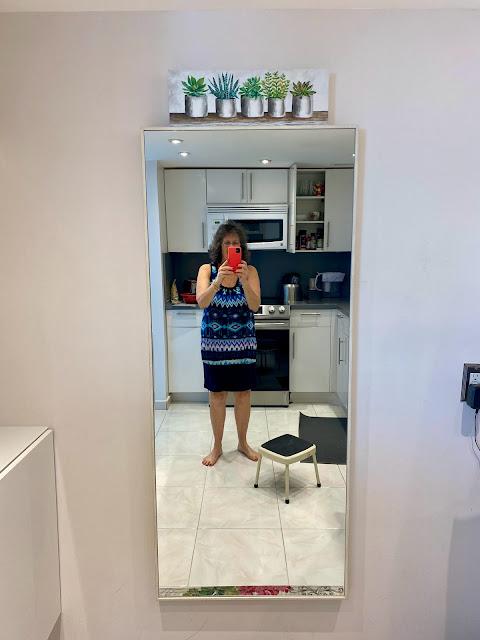mirror with reflection of woman