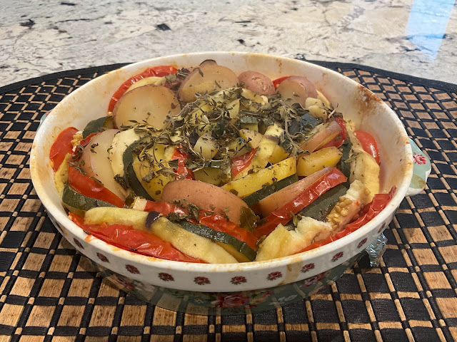 small casserole with layers of summer vegetables