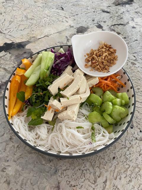 Vietnamese spring roll bowl with rice noodles