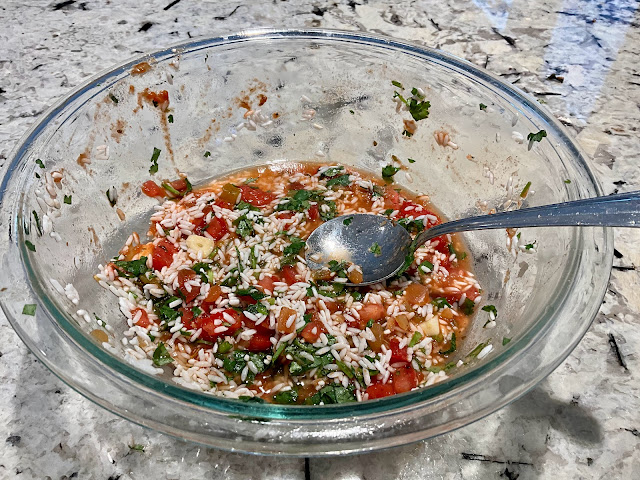 bowl with raw rice and seasoning, vegan