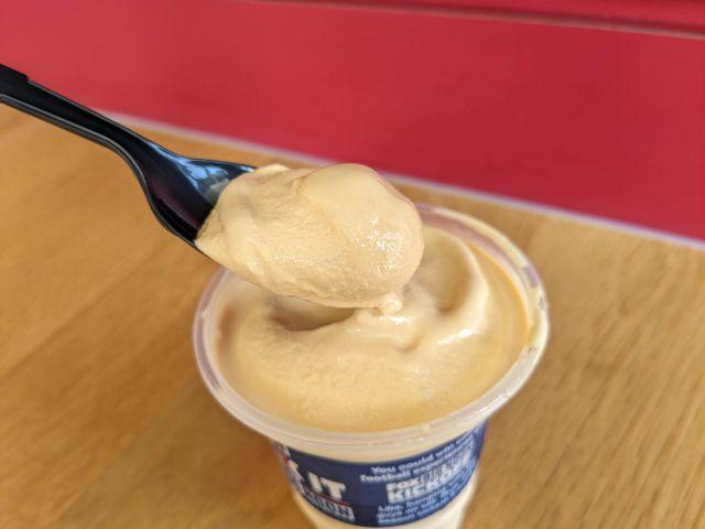 A spoonful of Wendy's Pumpkin Spice Frosty.