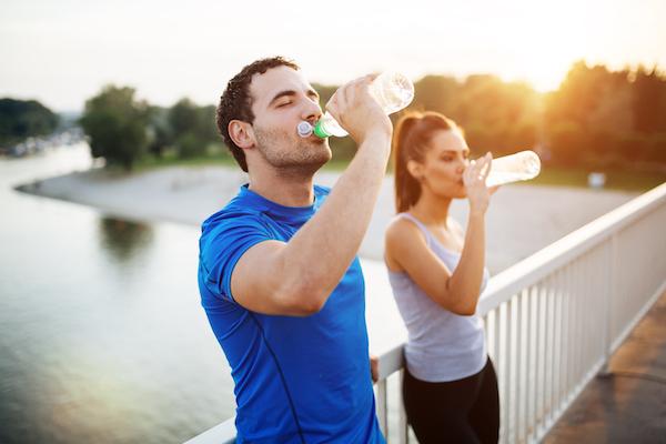 Couple Hydrating after workout | Dizzy After Workout