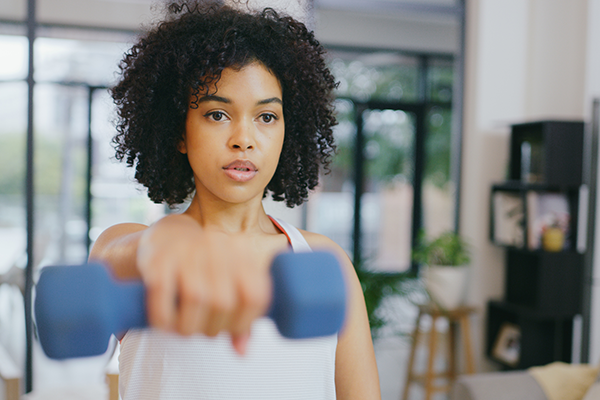 Woman Uses Dumbbell to Workout | Exercise with Foot Injury