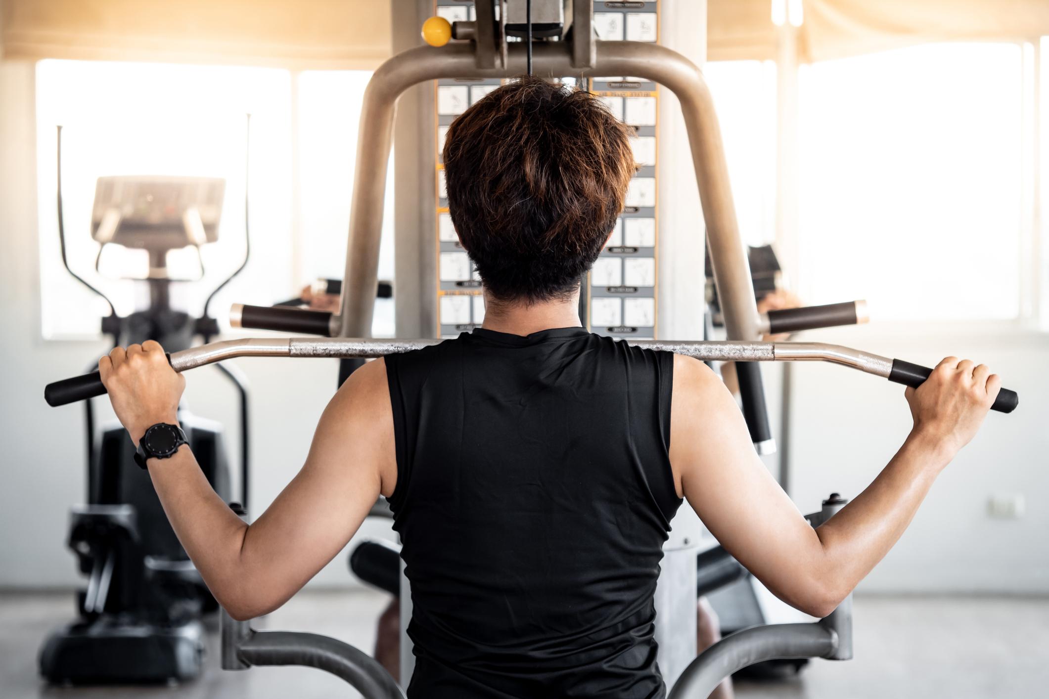 Man Does Lat Pull Downs | Lat Exercises