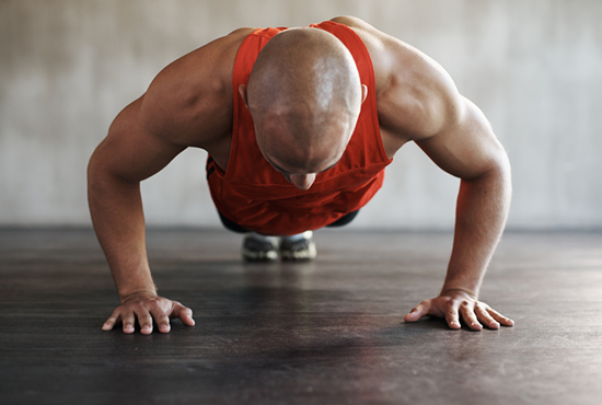 Image of Man doing Reduced Range of Motion Push Ups | Knee Push Ups