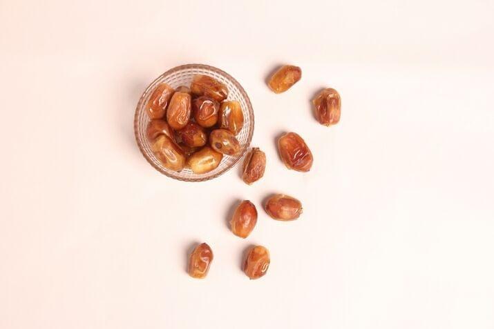 A selection of dates in a glass bowl