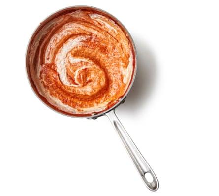 use a stick blender to whizz the sauce to a puree, then stir in the cream and vodka, and warm through.