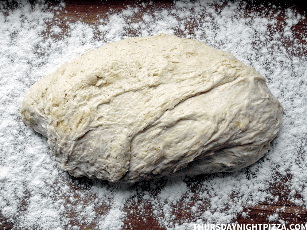 dough scraped onto counter