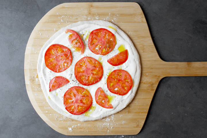 topping the pizza