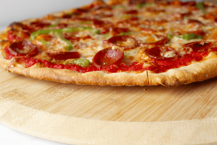 thin crust pizza dough, side view