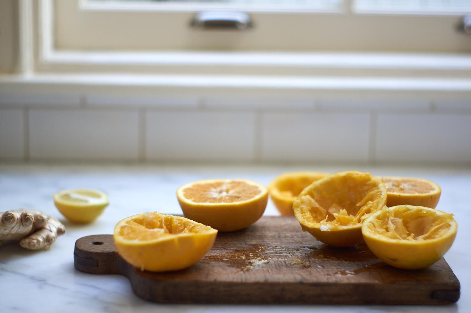 wood cutting board topped with slices of grapefruit