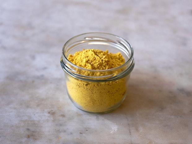 homemade bouillon powder in a small glass jar