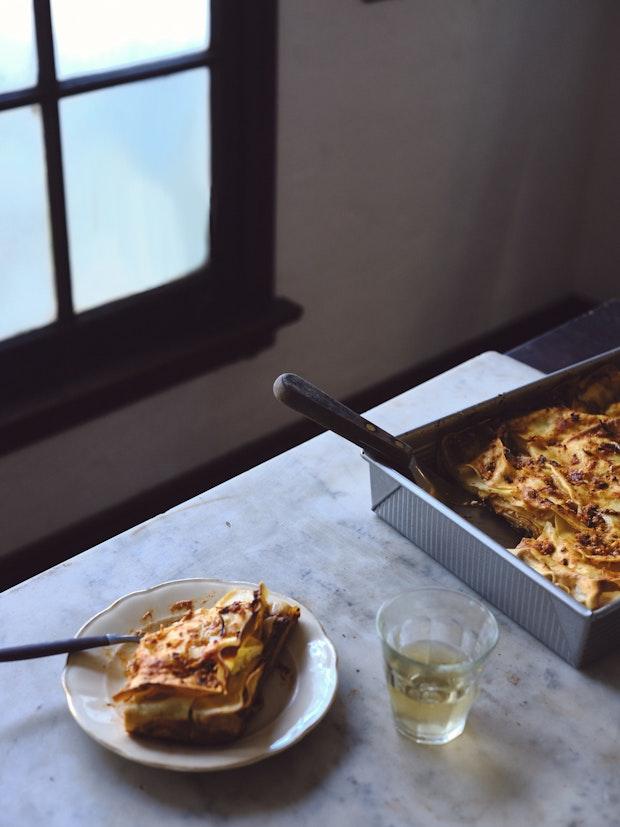 Mushroom Lasagna being served on a table