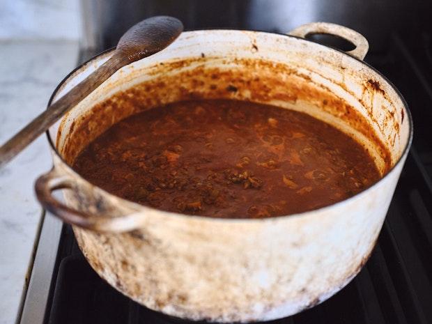 Mushroom ragù served over pasta in a wide bowl