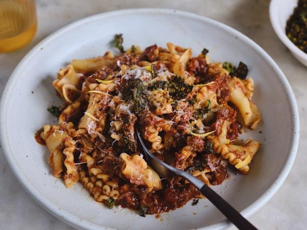 Mushroom ragù served over pasta in a wide bowl