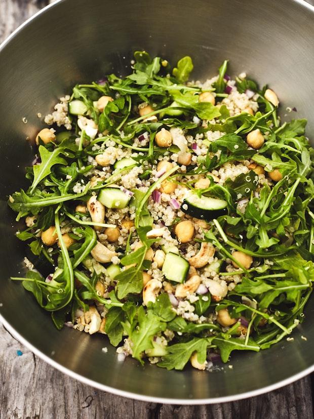 quinoa salad ingredients in a mixing bowl