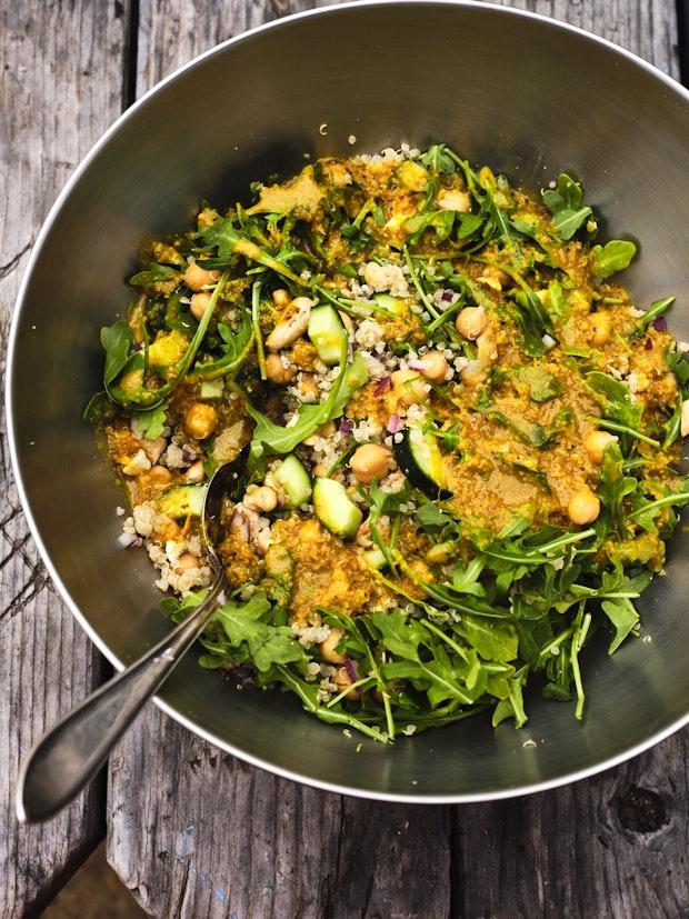 quinoa salad ingredients in a mixing bowl