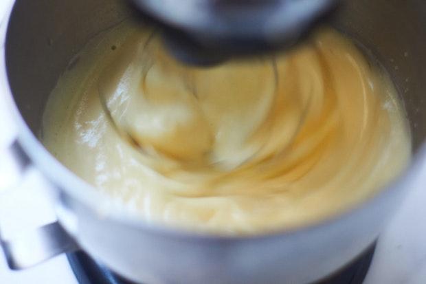 popover batter being mixed by an electric mixer