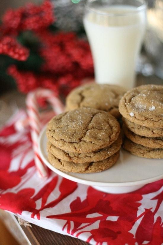 ginger cookies stacked on top of each other on a white plate