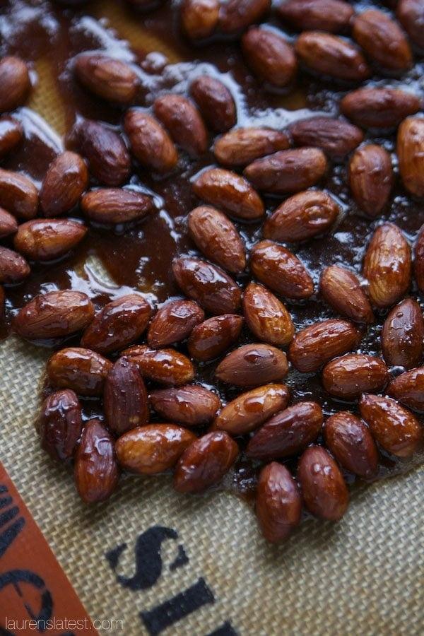 candied almonds on a baking sheet