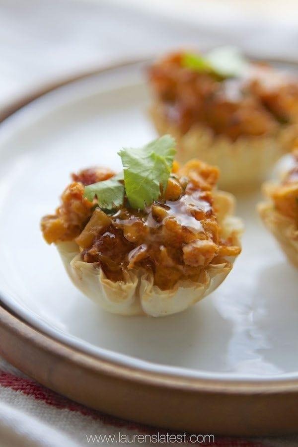 honey bbq cheesy chicken bites on a plate