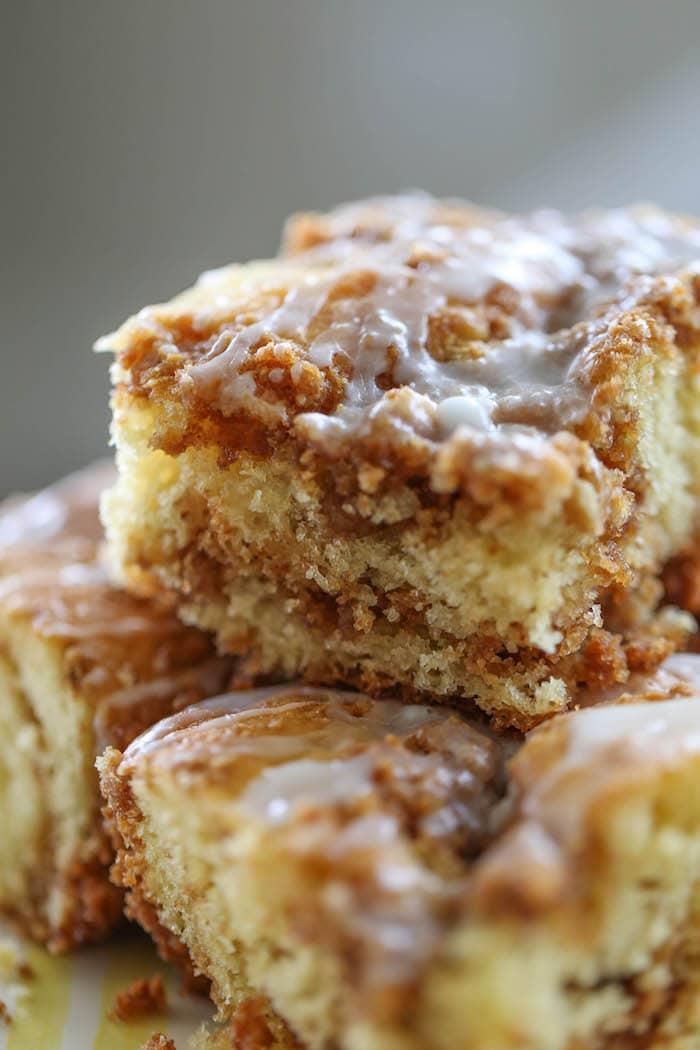 cinnamon streusel coffee cake slice on top of other slices