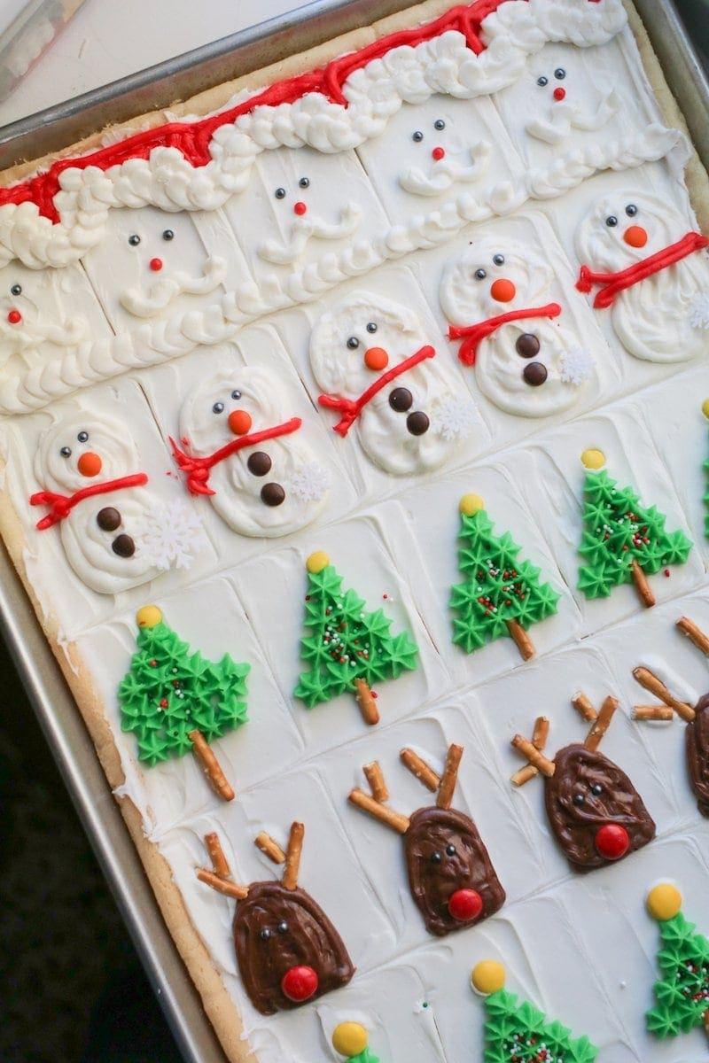 top down view of christmas sugar cookie bars decorated with frosting