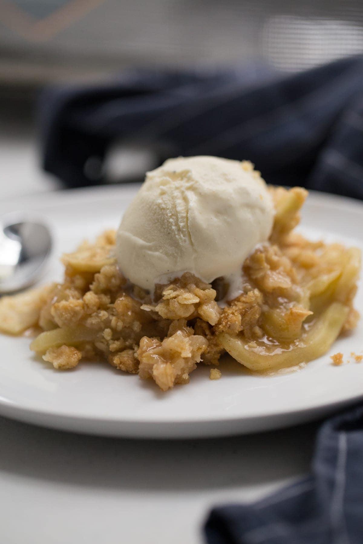 Apple crisp with vanilla ice cream on top