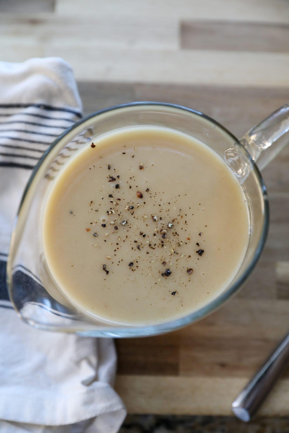 overhead photo of turkey gravy in gravy boat