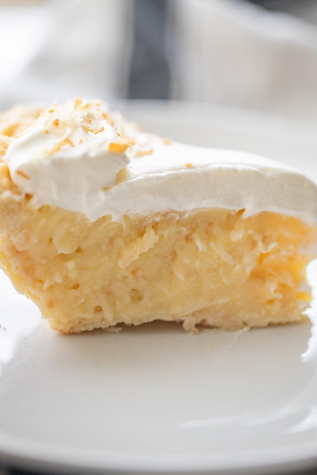 slice of coconut cream pie on plate