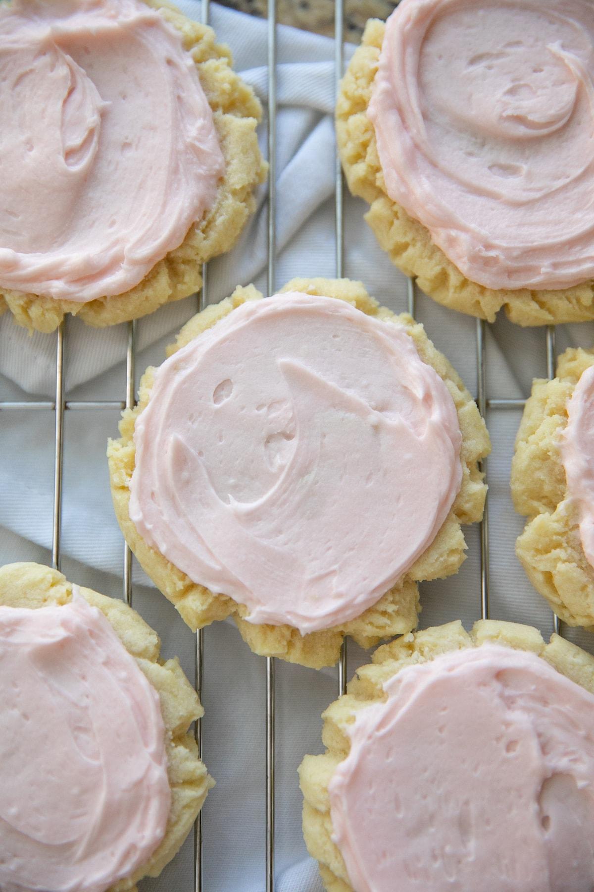 pressed sugar cookies on cooling rack